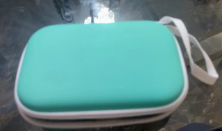 Custodia per fotocamera turchese