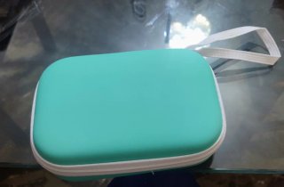 Custodia per fotocamera turchese