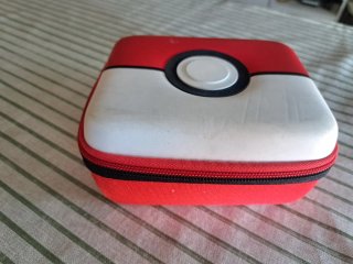 Lote cromos Pokémon y estuche