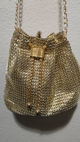 Bolso de fiesta dorado con cordón