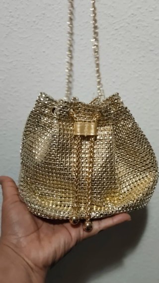 Bolso de fiesta dorado con cordón