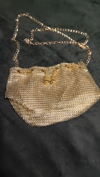 Bolso de fiesta dorado con cordón