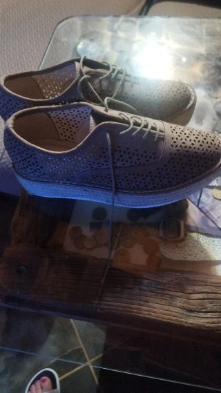 Zapatos de mujer perforados