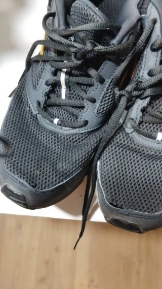 Zapatillas deportivas Kalenji negras y amarillas