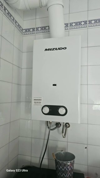 Esta nuevo usado 2 vece  Caldera de gas MIZUDO