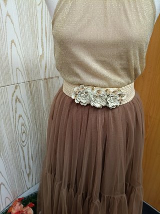 Conjunto dos piezas dorado y marrón