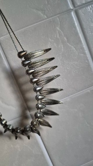 Collana effetto piuma argento