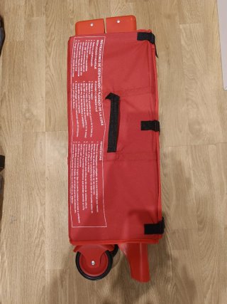Cuna de viaje roja
