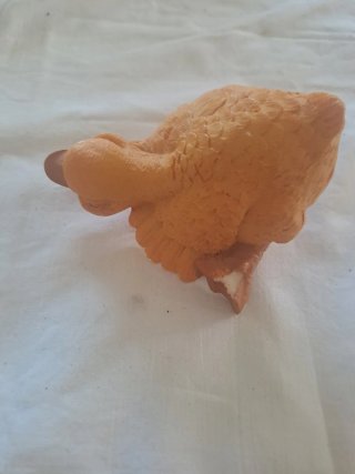 Pato de cerámica naranja