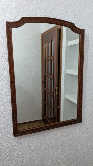 Espejo de madera tallada
