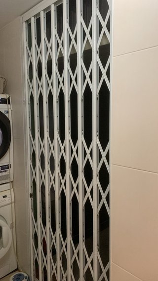 Reja extensible de seguridad