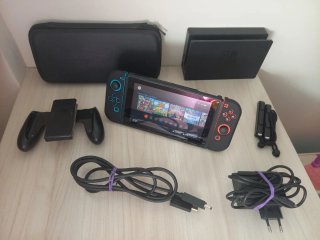 Nintendo Switch + juegos + accesorios