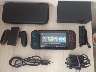 Nintendo Switch + juegos + accesorios