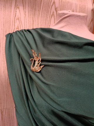 Vestido de fiesta verde drapeado
