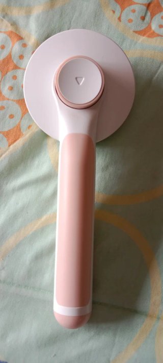 Cepillo autolimpiante para perros y gatos rosa