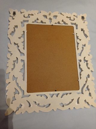 Espejo decorativo blanco con marco tallado