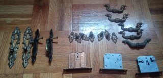 Lote Tiradores y Embellecedores Bronce