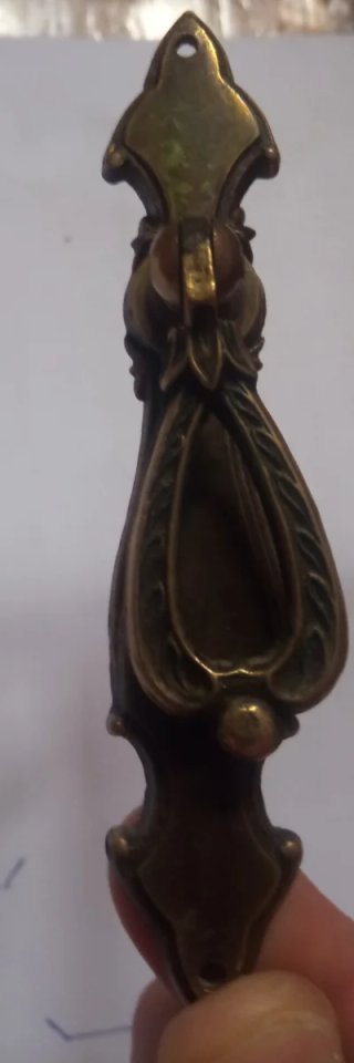 Lote Tiradores y Embellecedores Bronce
