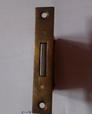 Lote Tiradores y Embellecedores Bronce