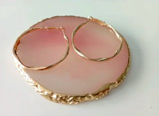 Pendientes Unode50 dorados retorcidos