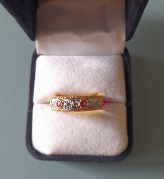 Anello eternity di bigiotteria oro argento rubino