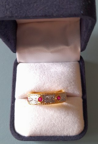 Anello eternity di bigiotteria oro argento rubino