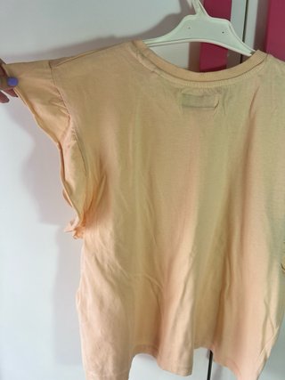 Camiseta naranja volantes manga corta