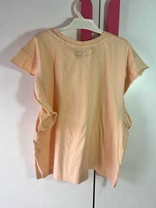 Camiseta naranja volantes manga corta