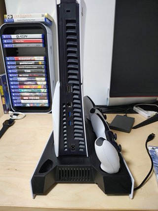PS5 Slim con 2 mandos, base y 2 juegos