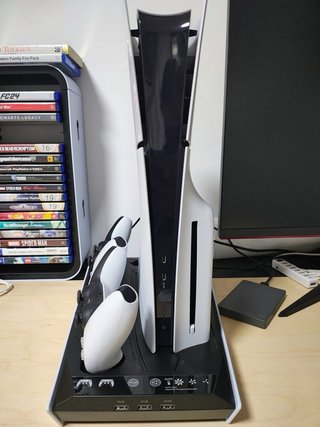 PS5 Slim con 2 mandos, base y 2 juegos