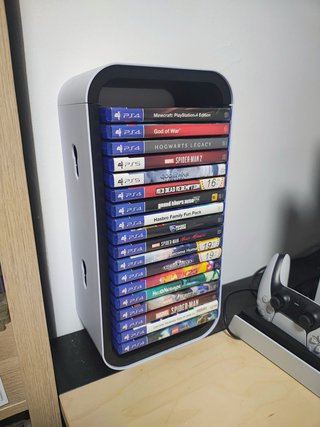 PS5 Slim con 2 mandos, 2 juegos, base y estante