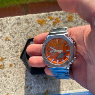 Reloj G-Shock Naranja y Plateado
