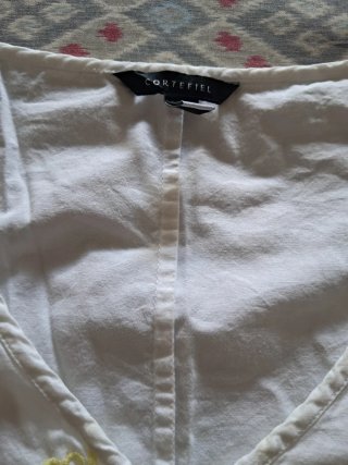 Camisa Cortefiel sin mangas blanca y amarilla