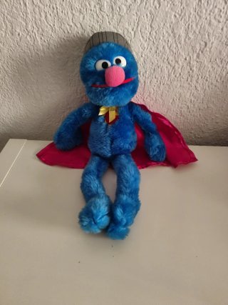 Peluche de Coco con capa