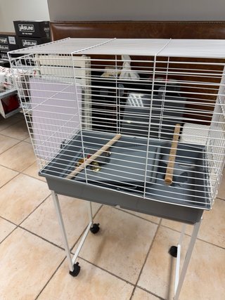Jaula para pájaros con soporte y ruedas