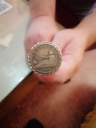 Bastón de amazona antiguo con moneda