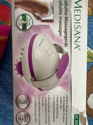 Masajeador anticelulitis rosa y blanco