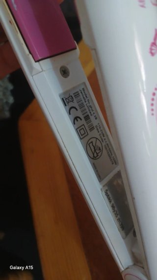 Plancha de pelo ghd rosa y blanca