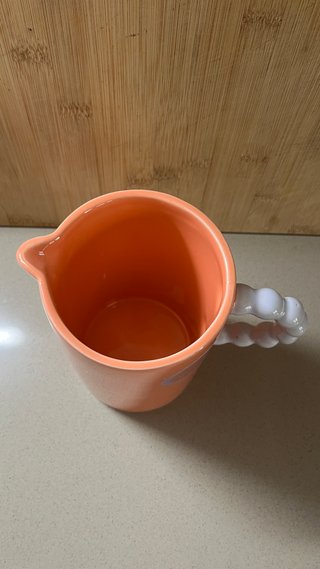 Jarra cerámica naranja asa burbuja