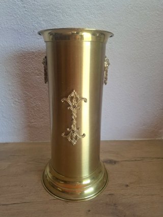 Paragüero metálico dorado con adornos