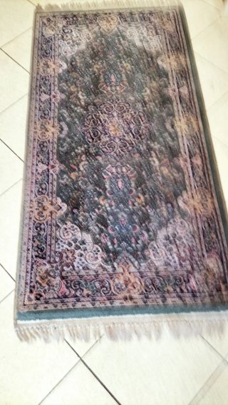 Tappeto decorativo verde e multicolore