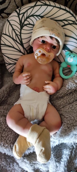 Reborn Niño silicona tipo plátino pelo injertado
