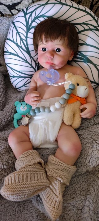 Reborn Niño silicona tipo plátino pelo injertado