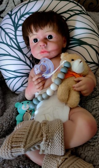 Reborn Niño silicona tipo plátino pelo injertado