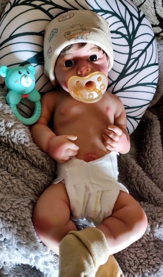 Reborn Niño silicona tipo plátino pelo injertado