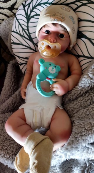 Reborn Niño silicona tipo plátino pelo injertado