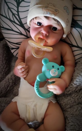 Reborn Niño silicona tipo plátino pelo injertado