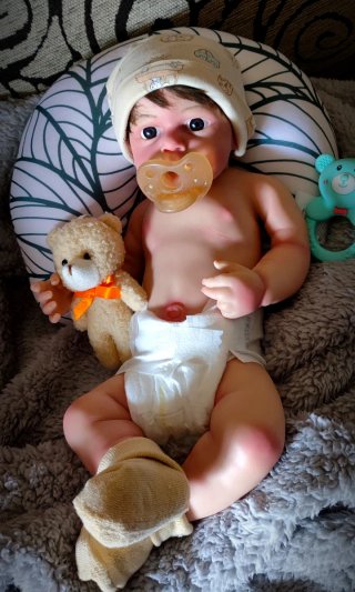 Reborn Niño silicona tipo plátino pelo injertado