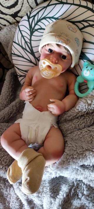 Reborn Niño silicona tipo plátino pelo injertado