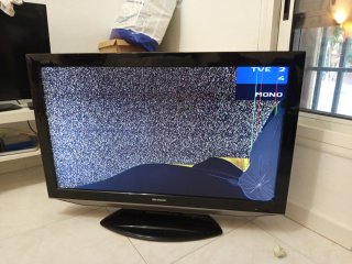 Soporte y televisor Sharp Negro